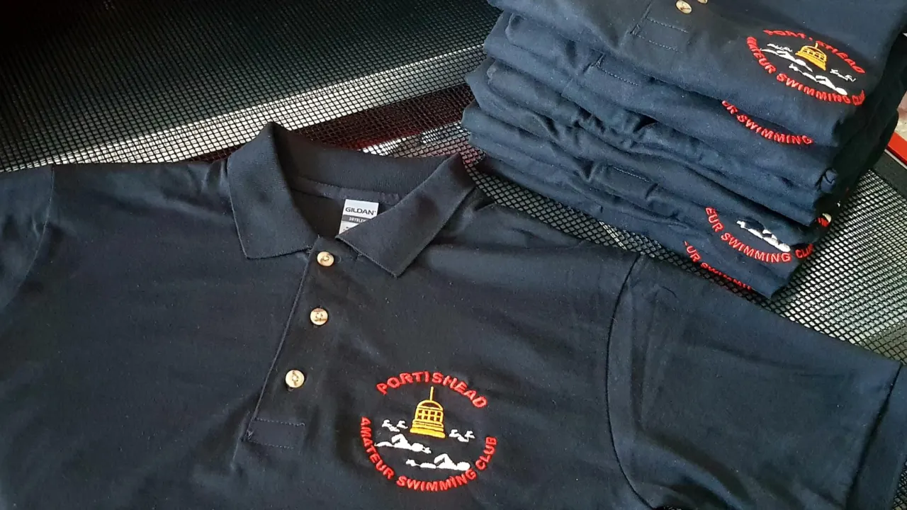 Navy polo shirts embroidered with the Portishead Amateur Swimming Club logo