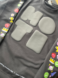 Black puff on sweater