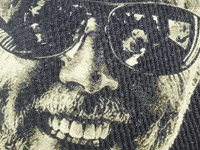 Halftone print of a face on a t-shirt